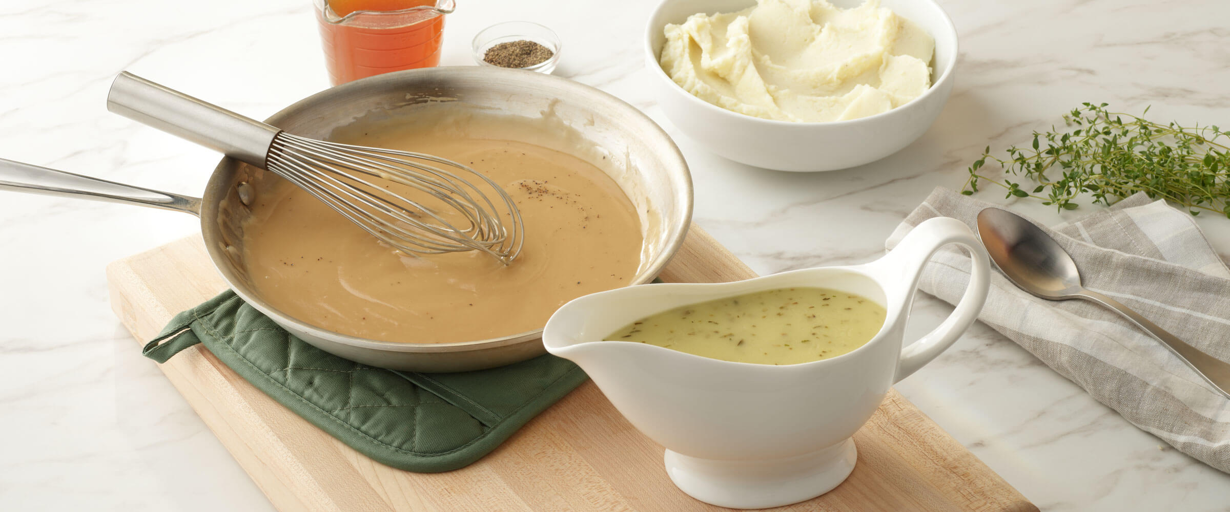 Easy HERB-OX® Cold Water Dissolve Gravy in bowl with mashed potatoes and herbs