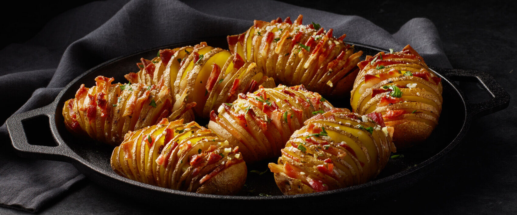 Garlic Rosemary Bacon Hasselback Potatoes - HORMEL® BLACK LABEL® Bacon