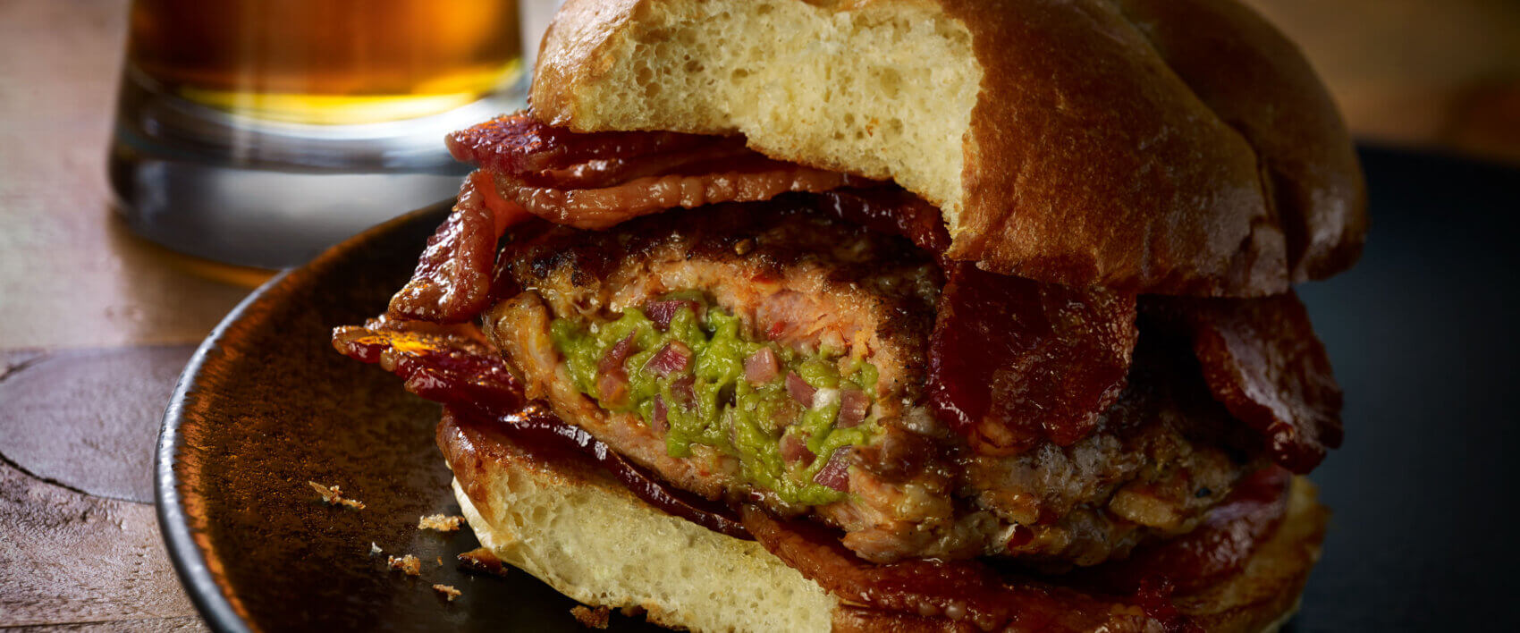 Bacon Guacamole Stuffed Sausage Burgers - HORMEL® BLACK LABEL® Bacon