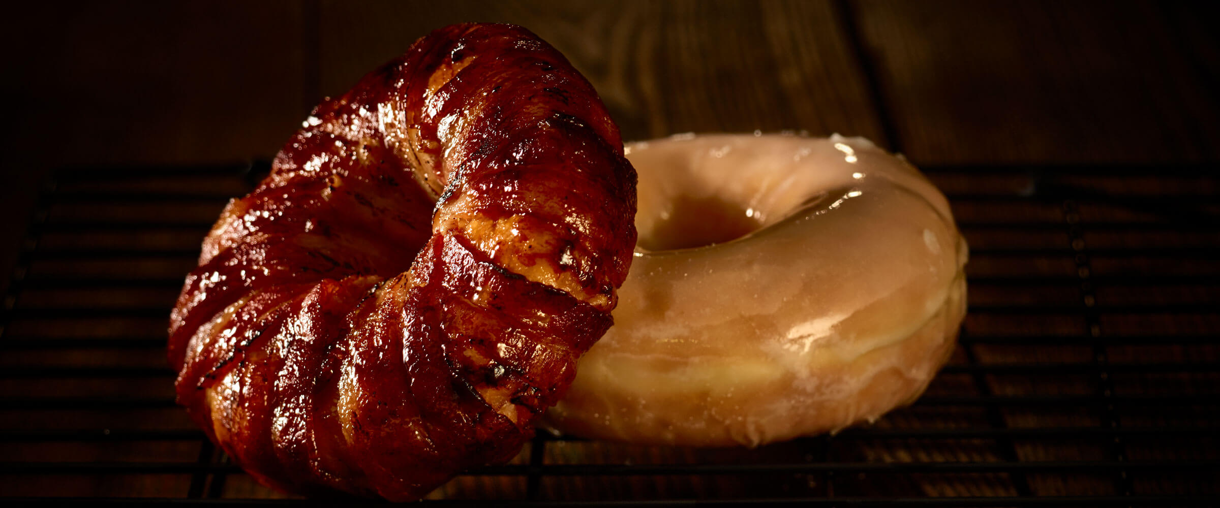 Brown sugar bacon wrapped donut and maple donut