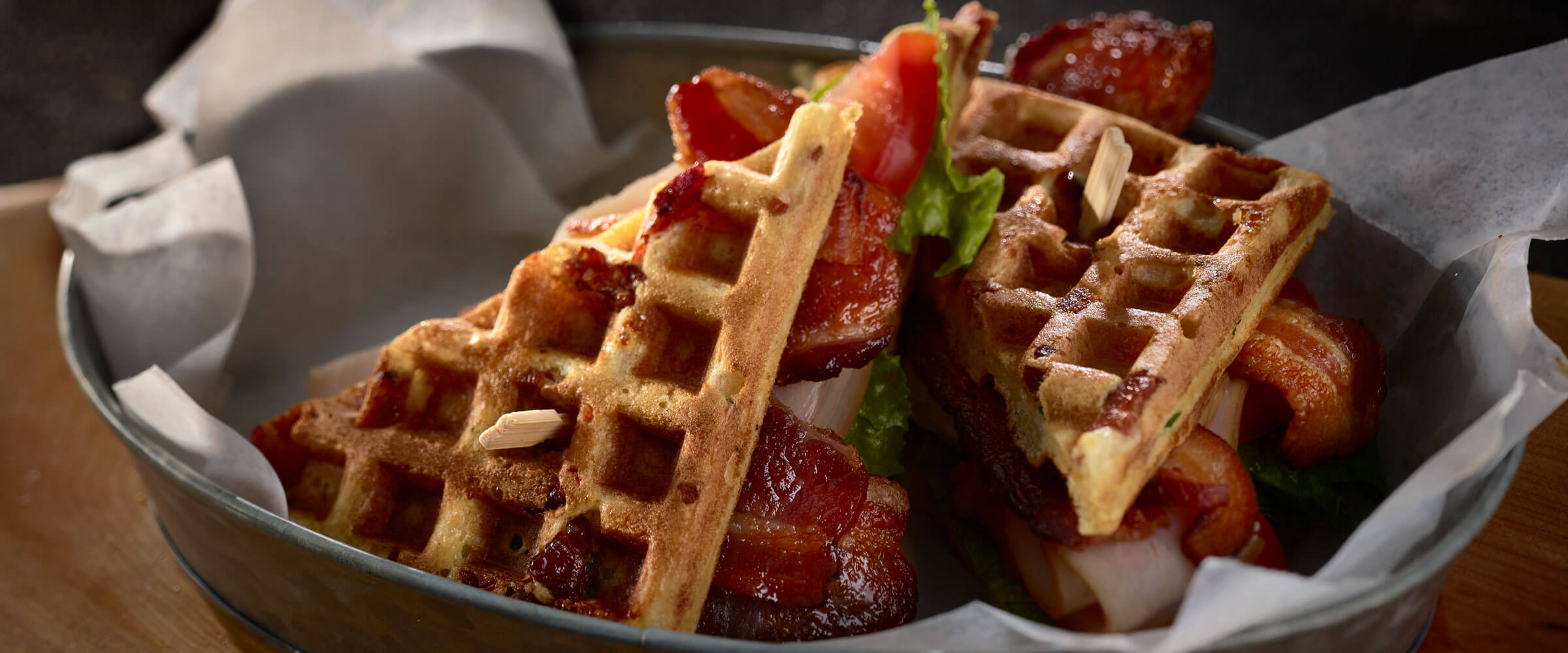 Pecanwood Bacon and Chicken Waffle sandwiches in serving bowl