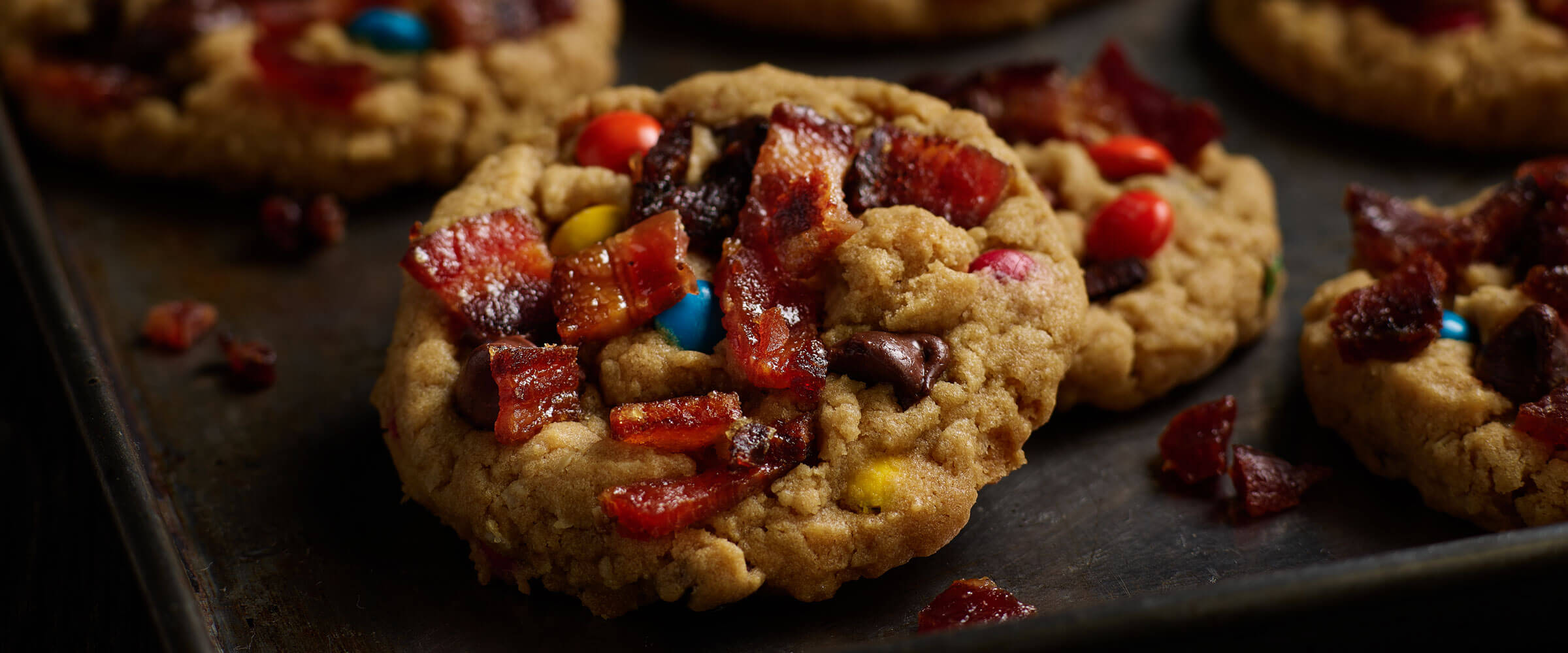 Candied Bacon Monster Cookies on serving tray