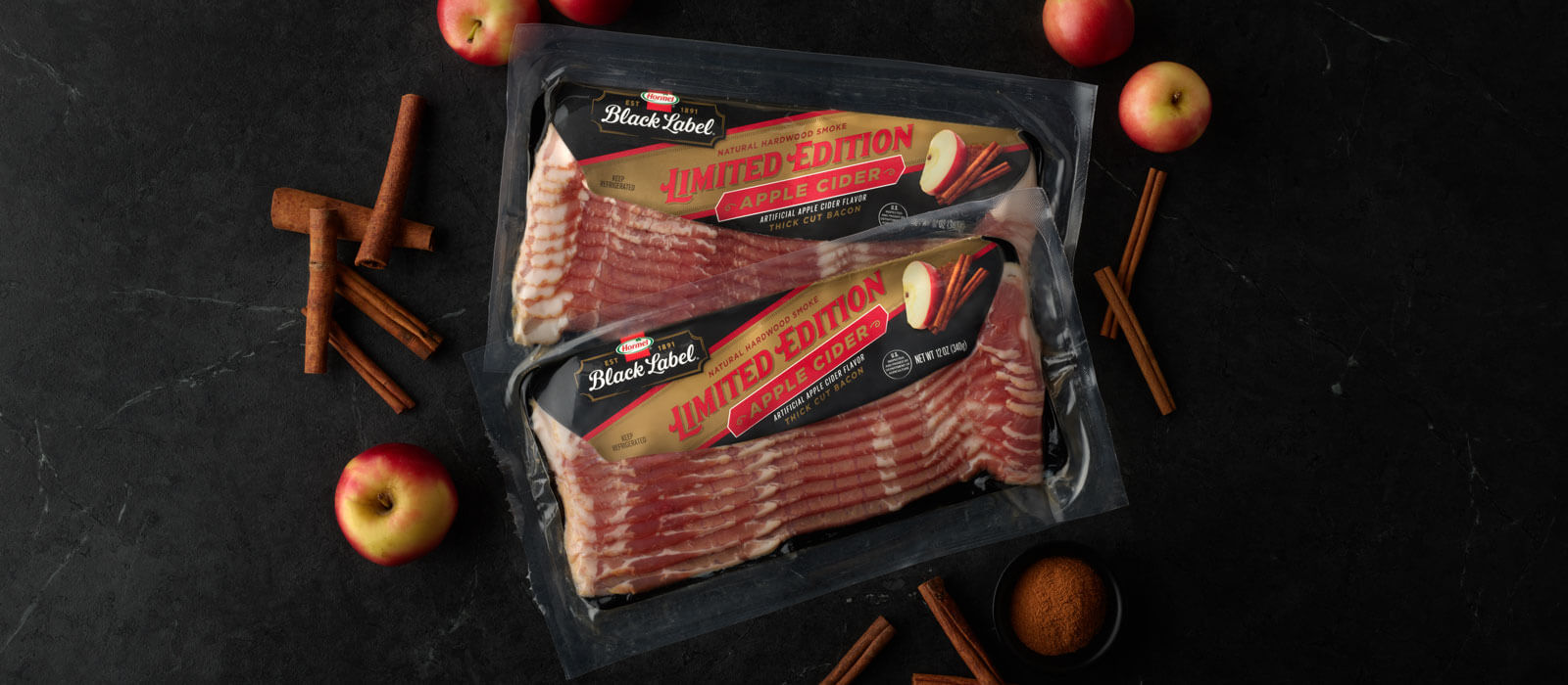 Apple Cider packaging Shot with apples and cinnamon stick on side
