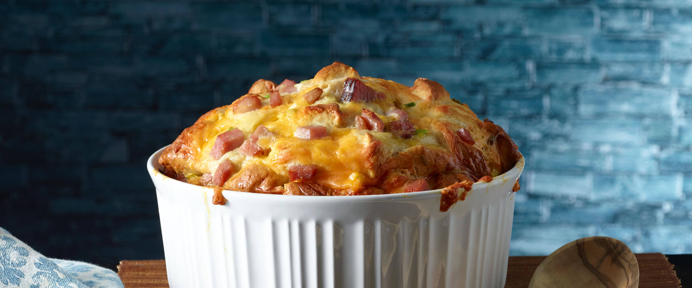 Ham-Egg and Cheese Monkey Bread in white dish