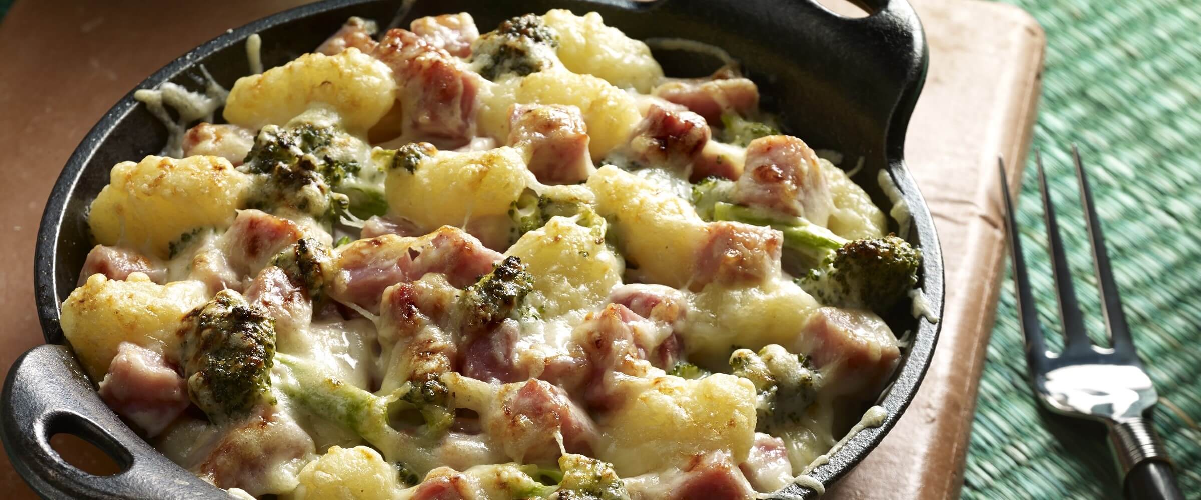 creamy ham and broccoli gnocchi in cast iron skillet