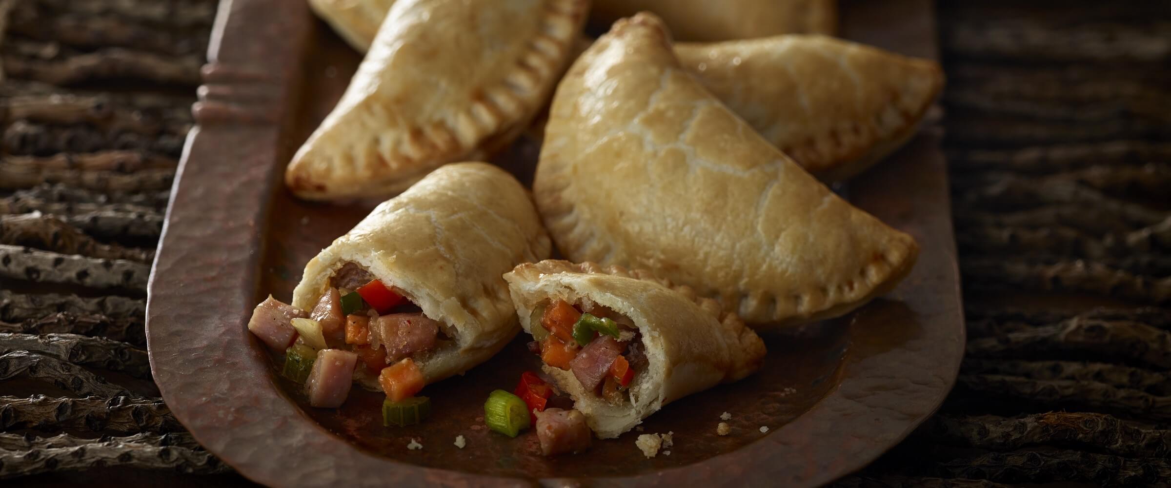 spicy country meat pies on platter