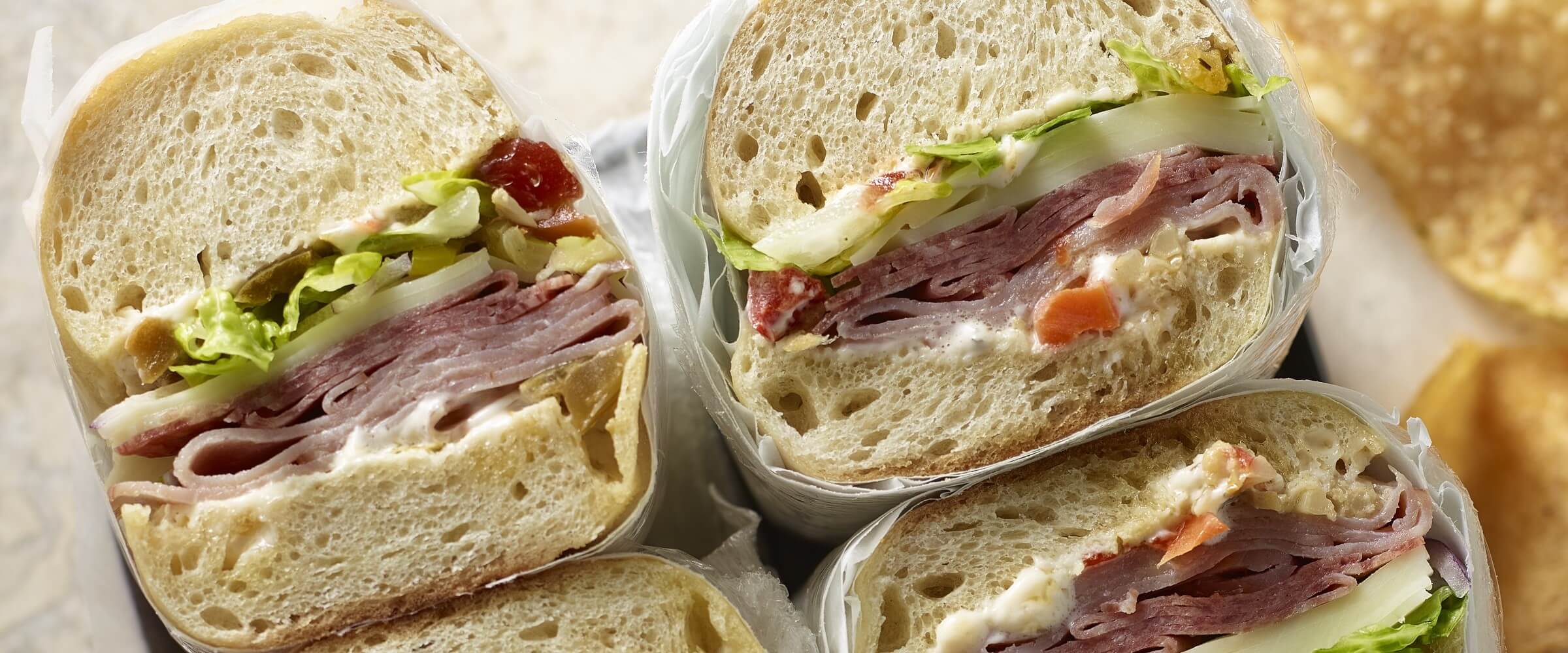 hoagie with vegetables wrapped in paper