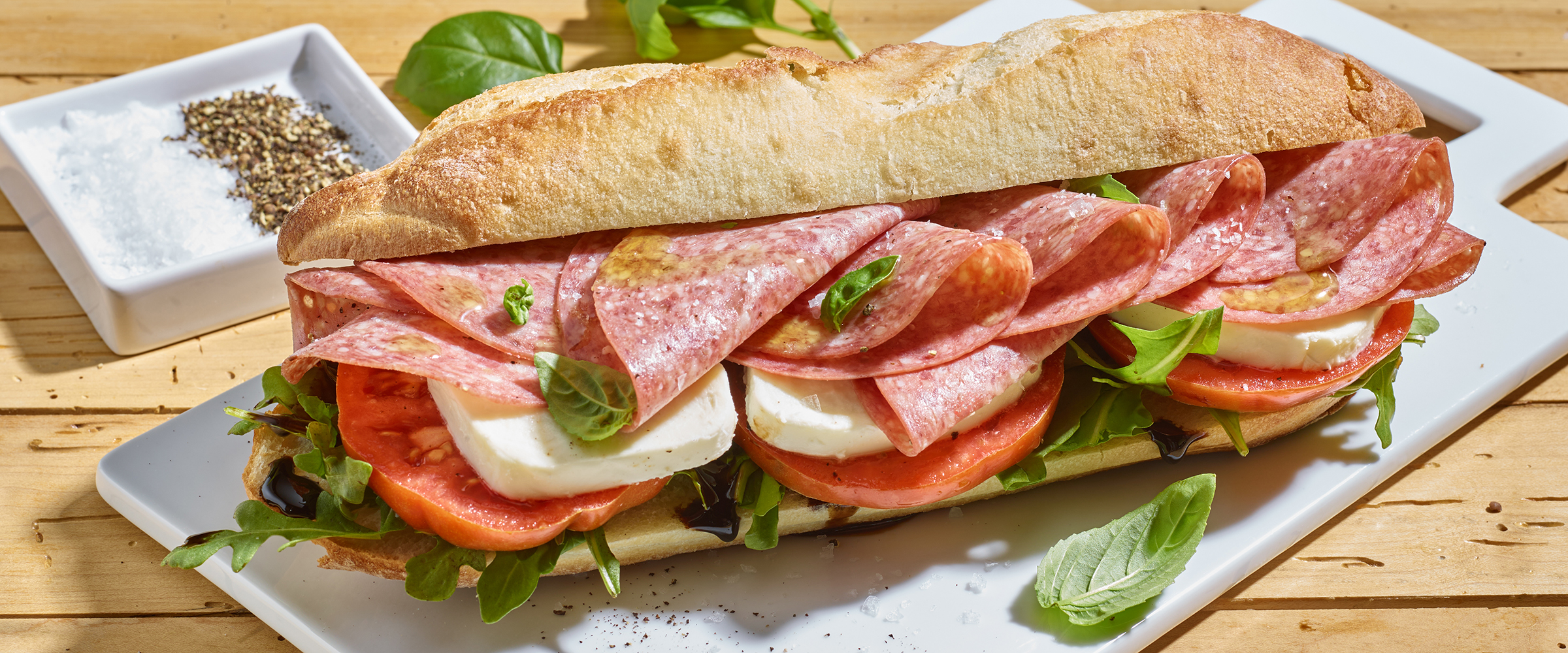 Caprese Salami Sandwich on a cutting board