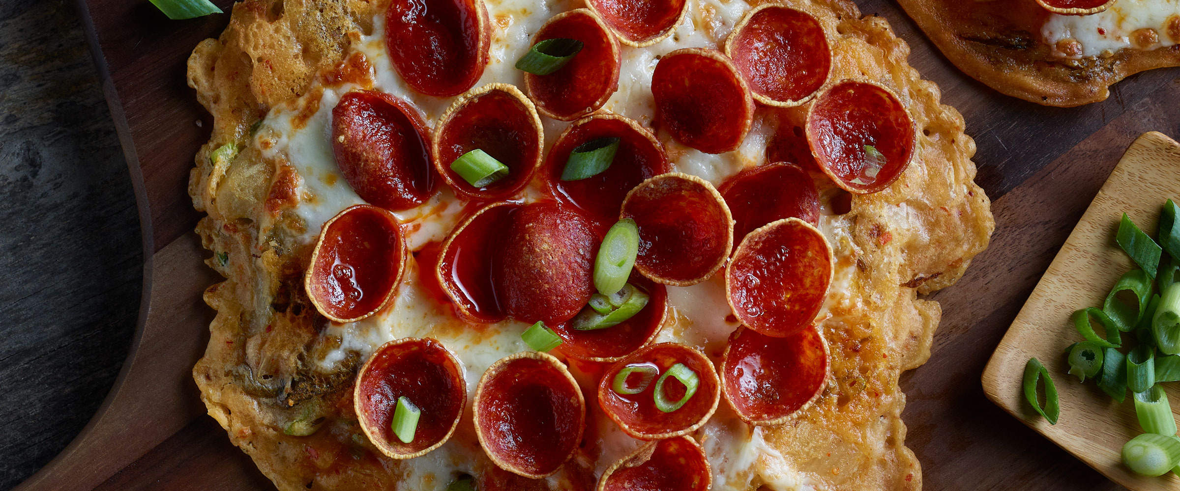 Kimchi Pancake Pizza topped with green onions