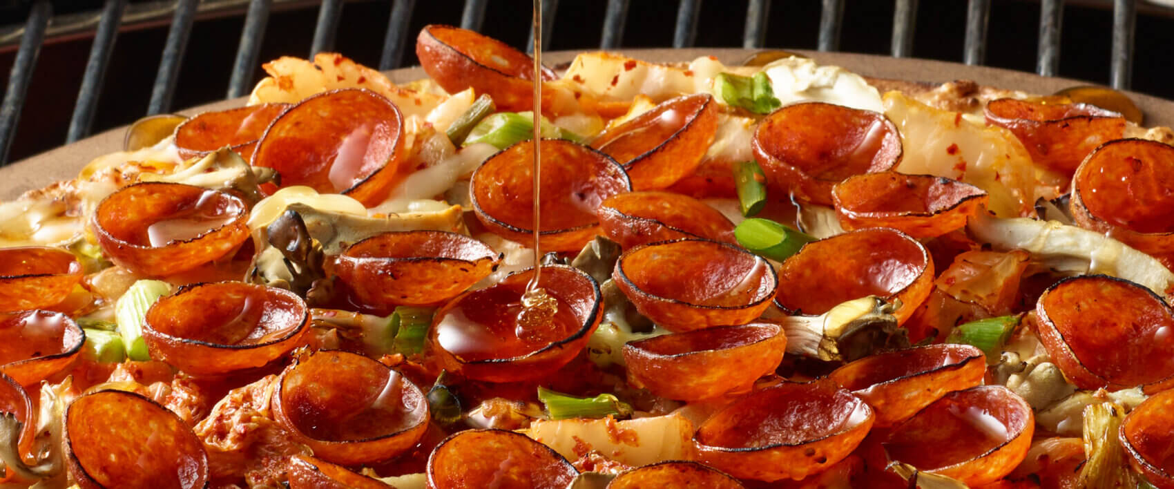 Grilled Cauliflower Crust Pizza with Pepperoni, Hot Honey and Kimchi