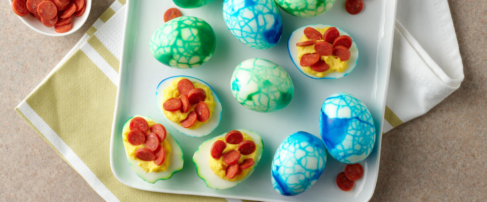 Pepperoni Dinosaur Deviled Eggs - HORMEL® Pepperoni