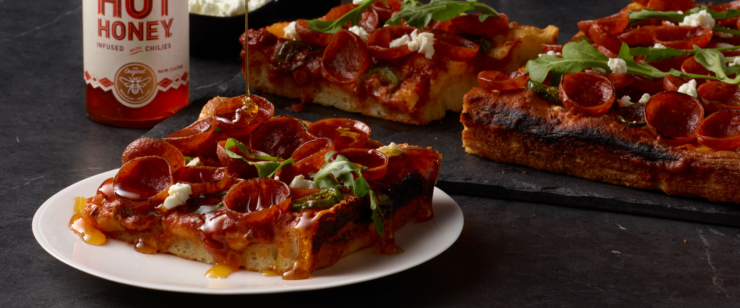 Cup N’ Crisp Pepperoni Detroit-Style Pizza drizzled with Hot Honey