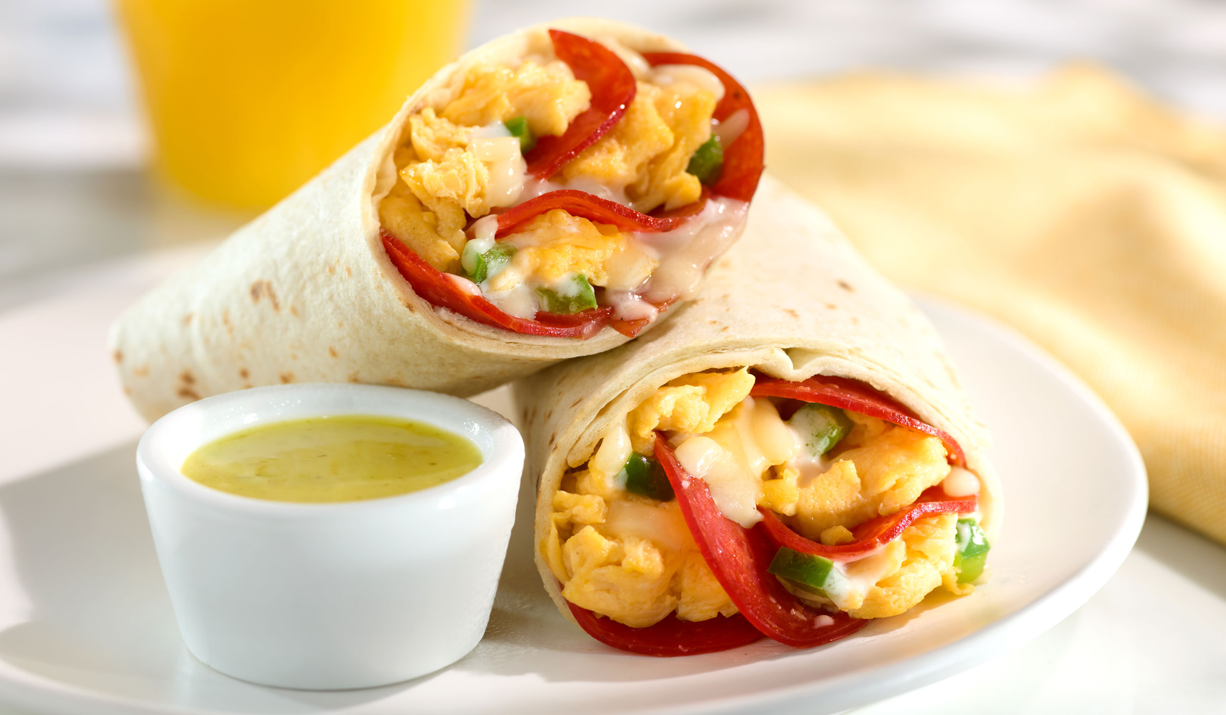 breakfast burrito with pepperoni, eggs and peppers