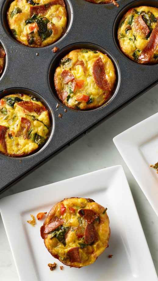 Egg muffins with pepperoni in a muffin tin