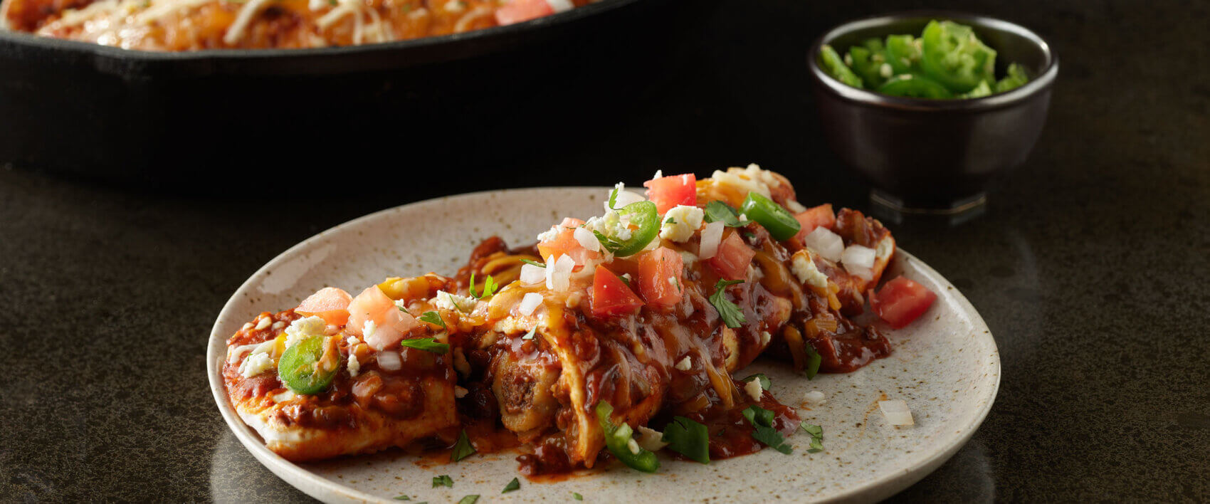 Tamale Stuffed Chili Enchiladas - HORMEL® Tamales