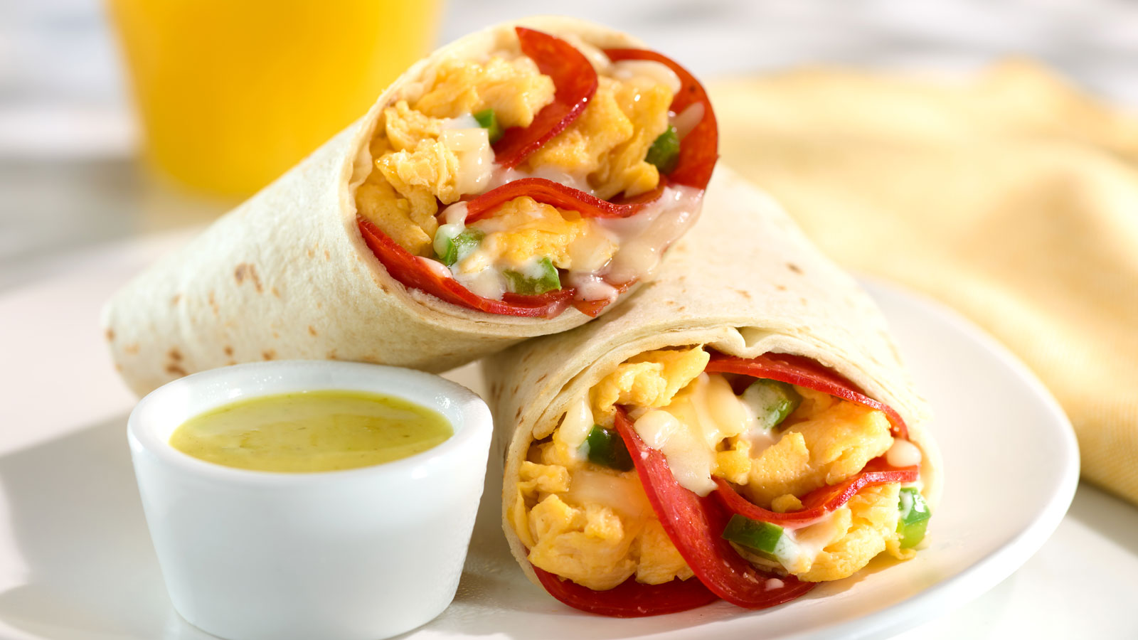 eggs and pepperoni in a burrito
